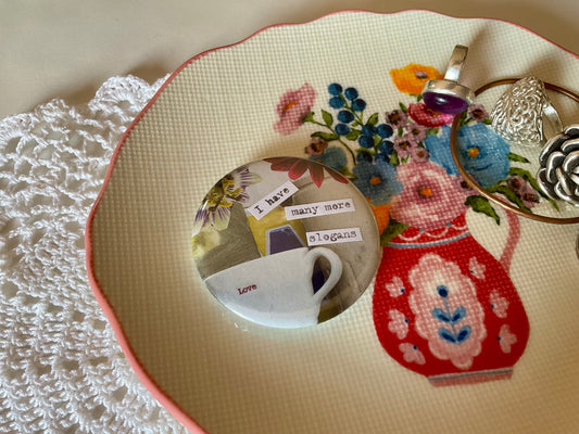 Slogans and Teacups badge large